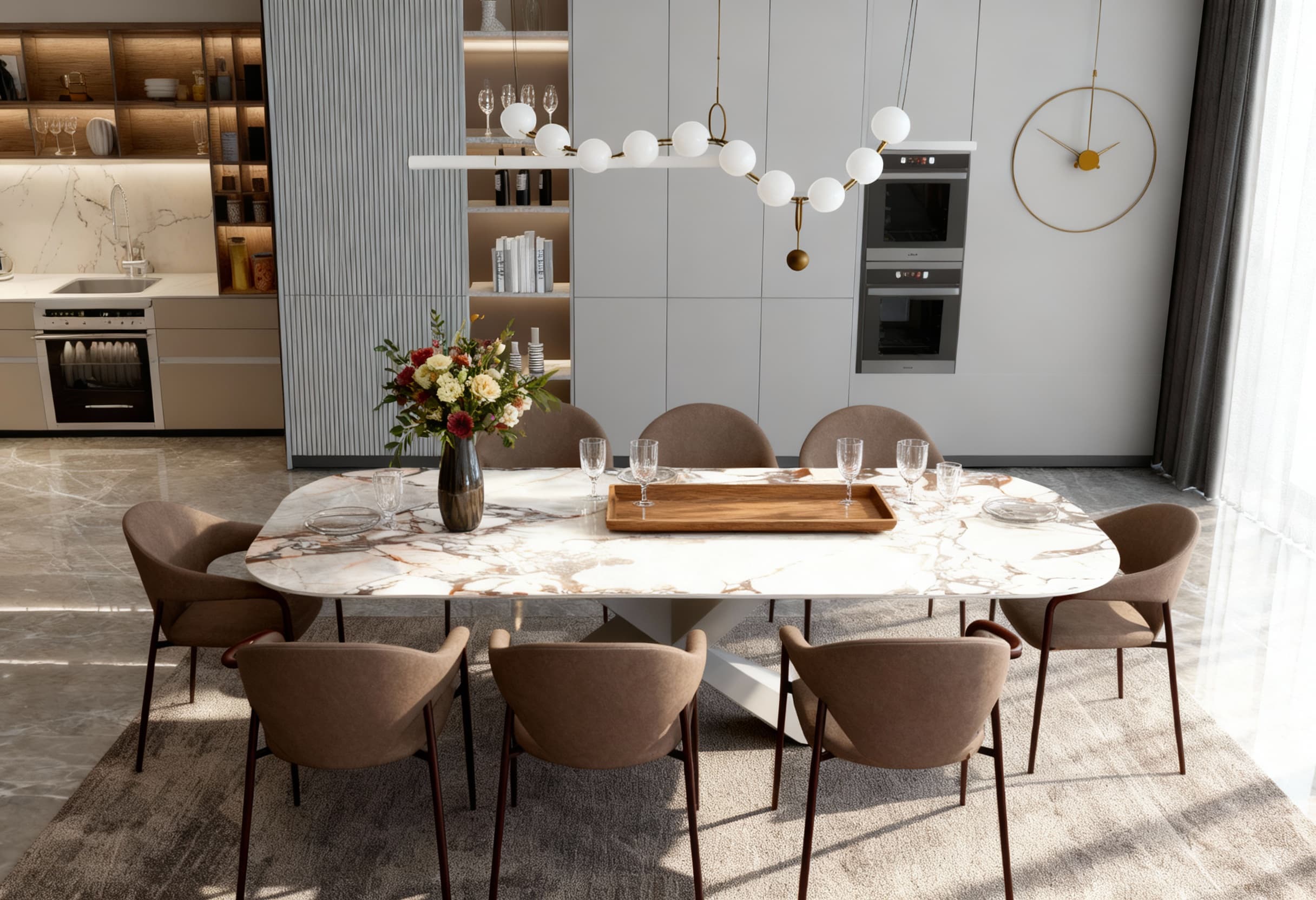 White marble effect dining table with soft rounded corners, set for dinner with brown upholstered chairs in a bright modern kitchen